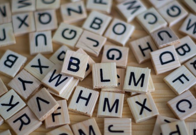 Scrabble tiles in a pile.